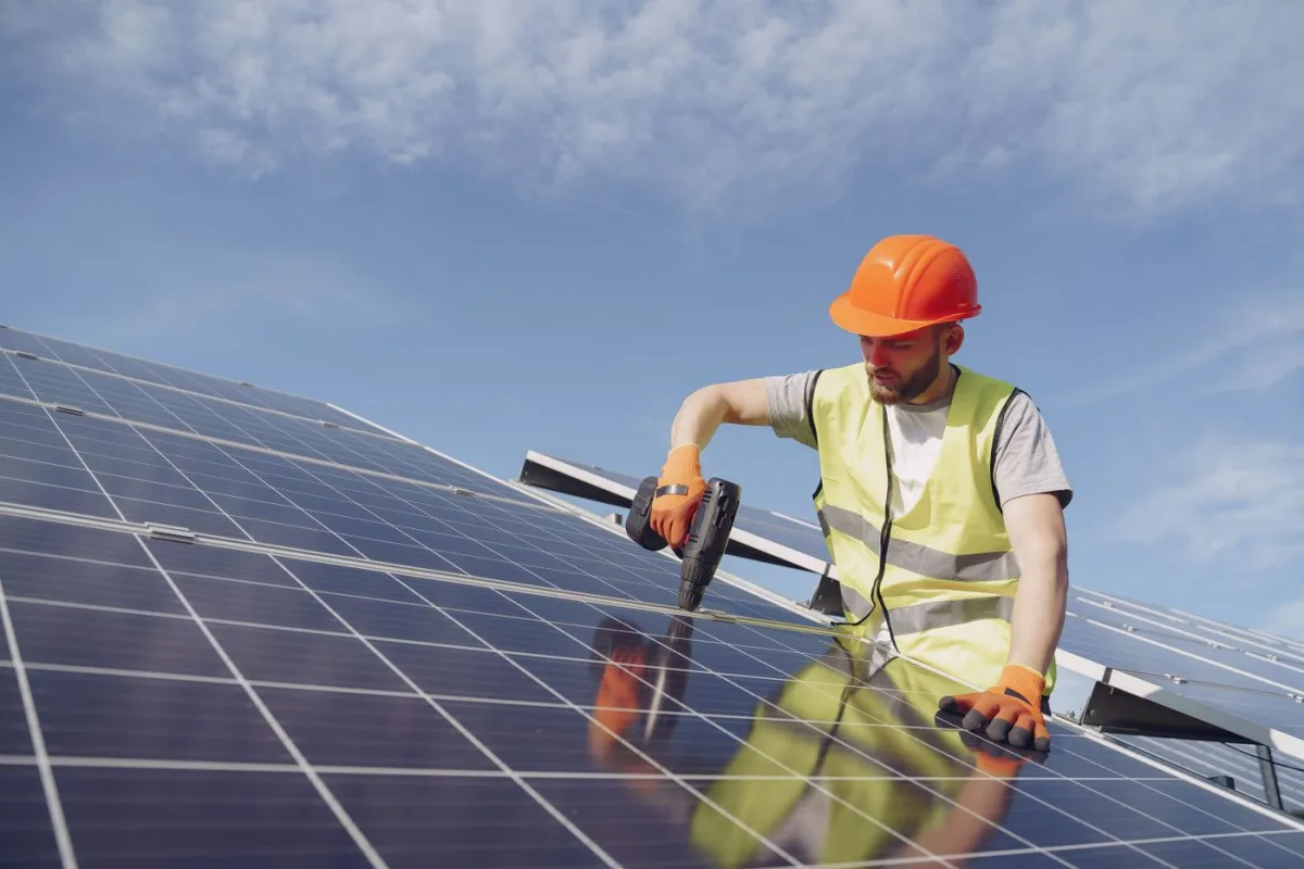 Lachlan Solar technician servicing a solar panel system